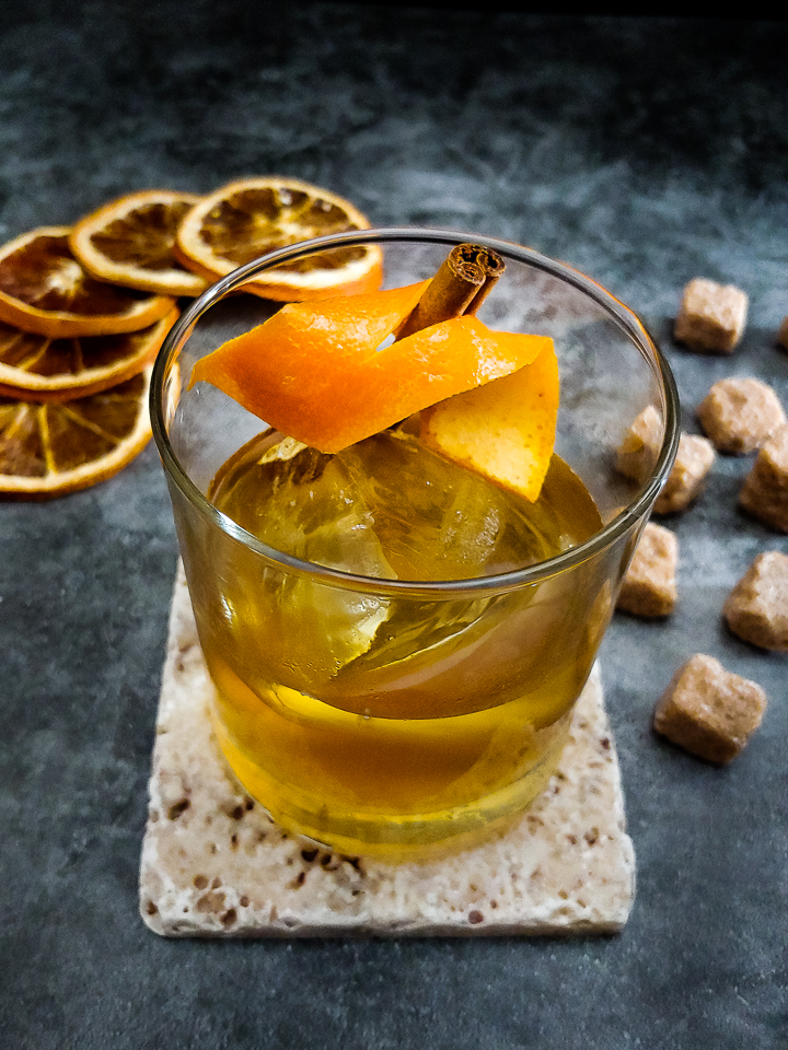 Glass of bourbon over smoked ice cubes garnished with smoked oranges. It's  1700 somewhere : r/Traeger